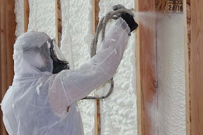 SWD spray foam insulation installer, insulating home's walls.