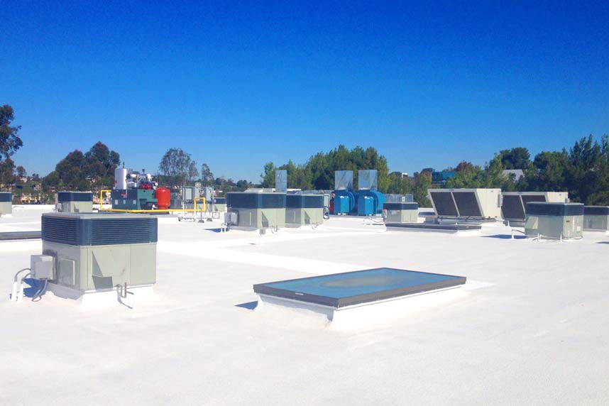 View of spray foam insulation installed on flat roof