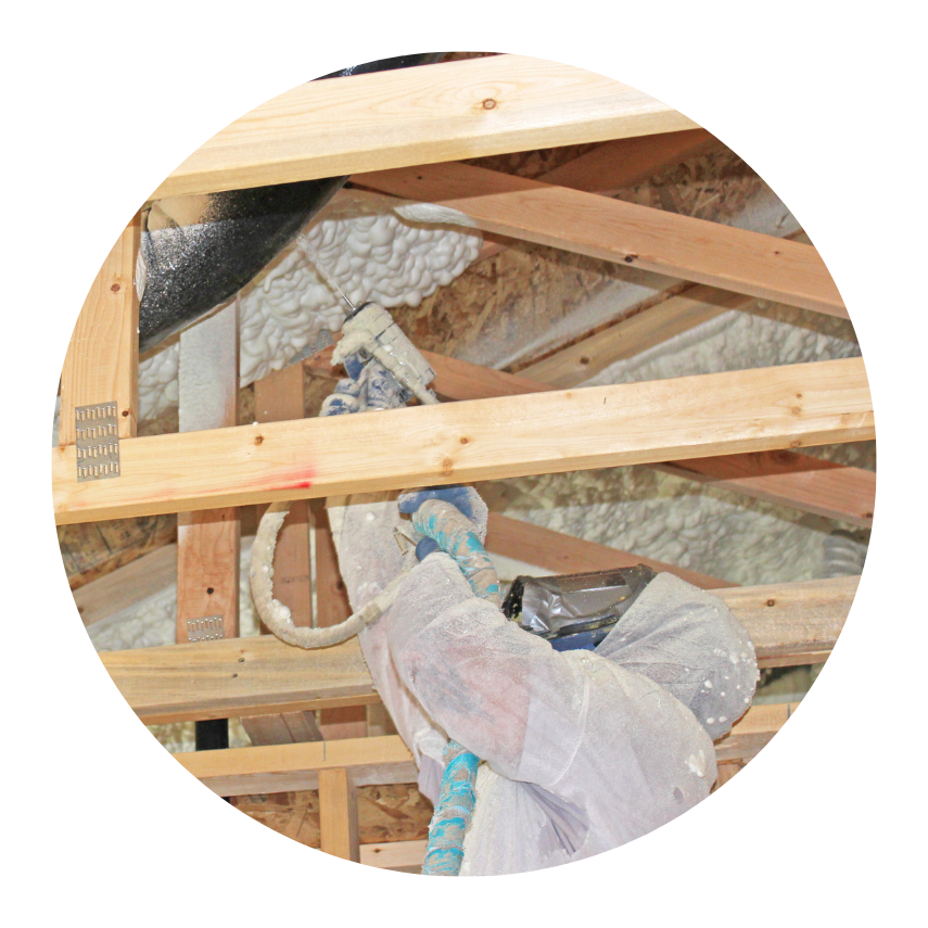 Untitled-53.png: Person smiling, wearing a teal cap and pink shirt indoors