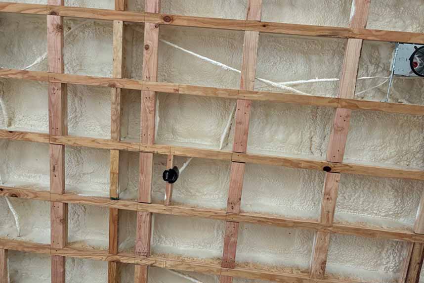 Wood-framed ceiling filled with SWD QUIK‑SHIELD HYDRA‑XC.